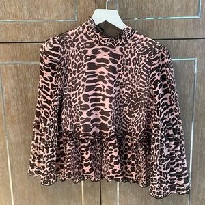 Ganni bonk and brown blouse